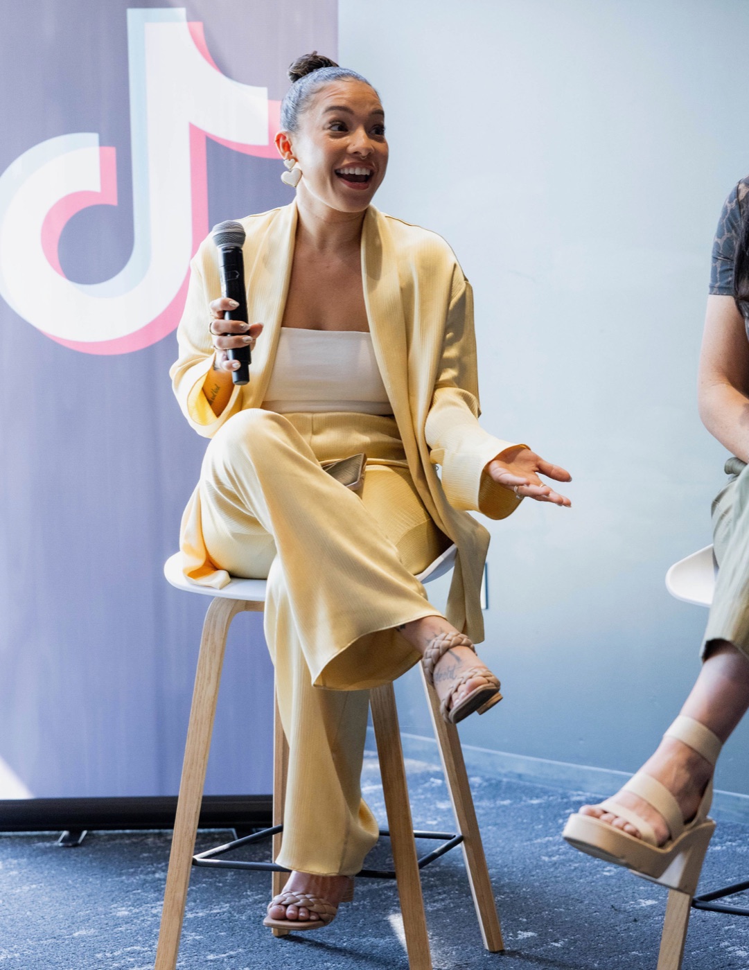 Tamar speaking on a TikTok creator panel